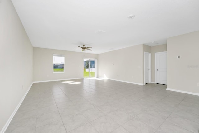 4288 Blackshear Ct, Clermont, FL 34714 - empty room with a ceiling fan and baseboards