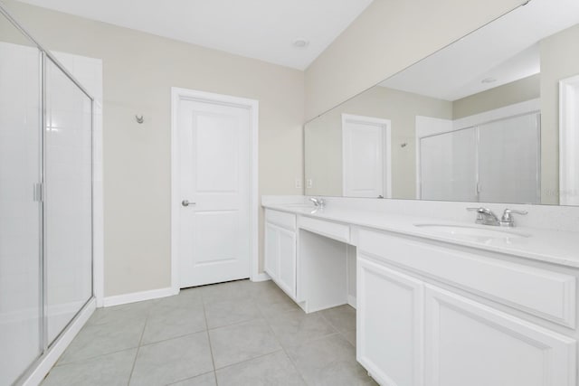 4288 Blackshear Ct, Clermont, FL 34714 - bathroom featuring double vanity, a stall shower, and tile patterned flooring