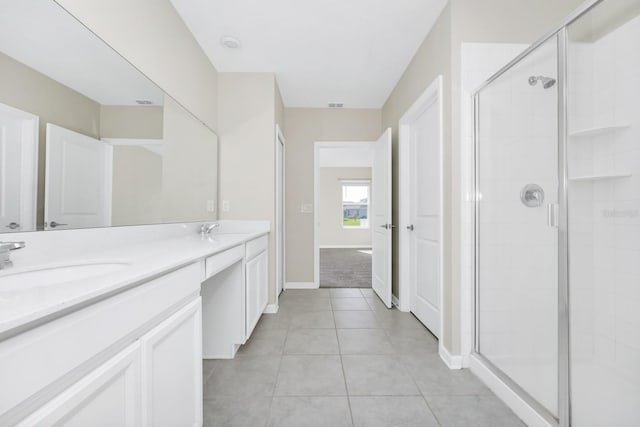 4288 Blackshear Ct, Clermont, FL 34714 - bathroom with double vanity, a shower stall, and tile patterned flooring