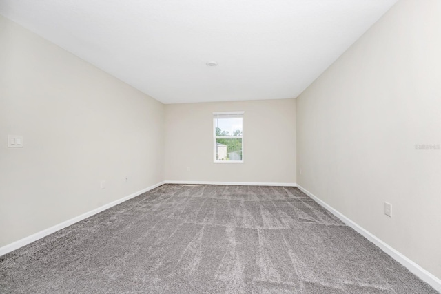 4288 Blackshear Ct, Clermont, FL 34714 - carpeted empty room with baseboards