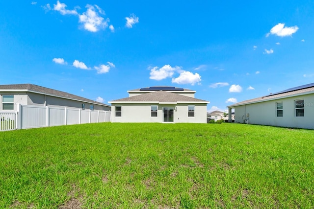 4288 Blackshear Ct, Clermont, FL 34714 - back of house featuring solar panels