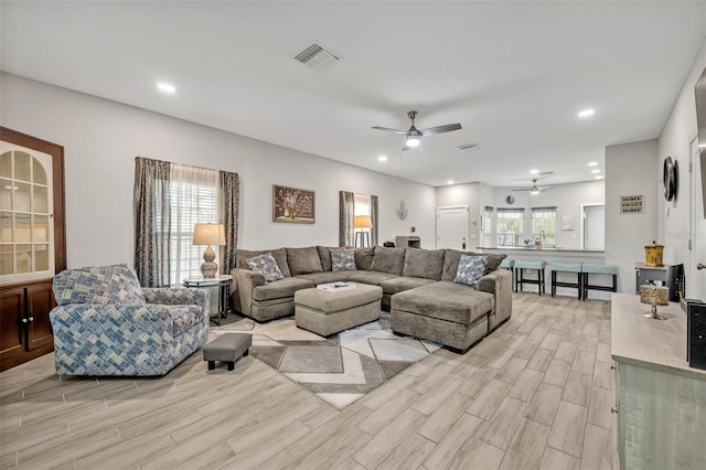 4636 Piedmont St, Orlando, FL 32811 - living area featuring light wood-style flooring, a ceiling fan, and recessed lighting