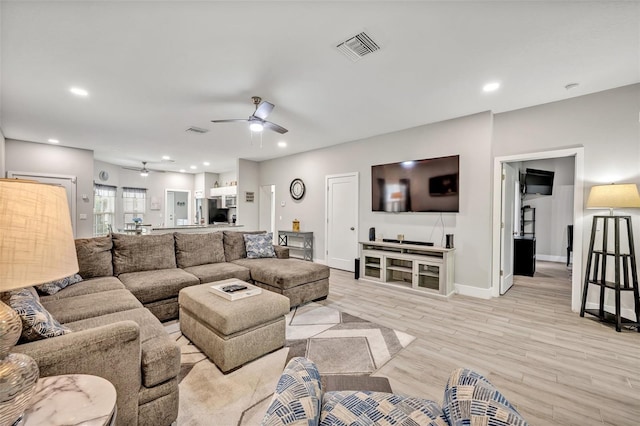 4636 Piedmont St, Orlando, FL 32811 - living area featuring ceiling fan, light wood-type flooring, and recessed lighting