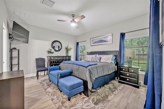 4636 Piedmont St, Orlando, FL 32811 - bedroom with wood finished floors and ceiling fan