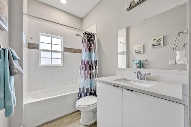 4636 Piedmont St, Orlando, FL 32811 - full bathroom featuring vanity, wood finished floors, and shower / bath combo