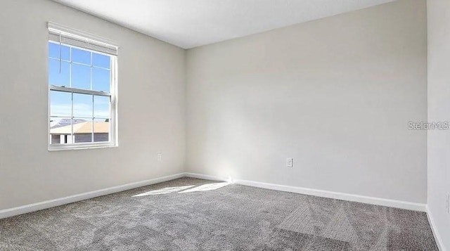 16480 Fernridge St, Clermont, FL 34714 - carpeted spare room featuring baseboards
