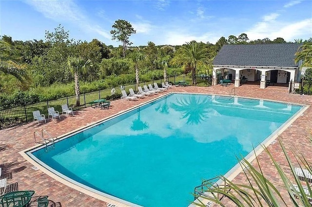 16480 Fernridge St, Clermont, FL 34714 - community pool with a patio area