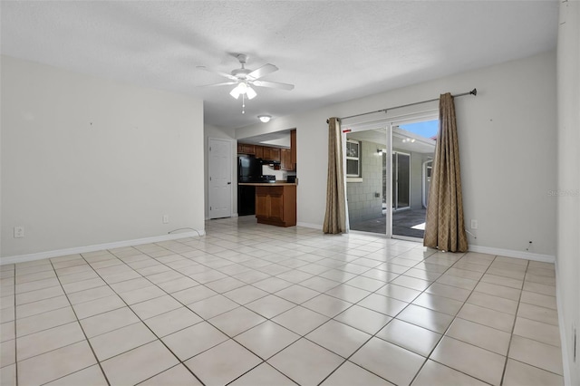 7201 Pleasant Dr, Orlando, FL 32818 - unfurnished living room with ceiling fan, a textured ceiling, and light tile patterned flooring