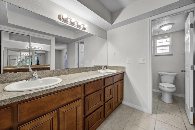 7201 Pleasant Dr, Orlando, FL 32818 - bathroom with double vanity and tile patterned floors
