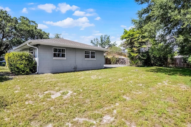 7201 Pleasant Dr, Orlando, FL 32818 - back of house with concrete block siding