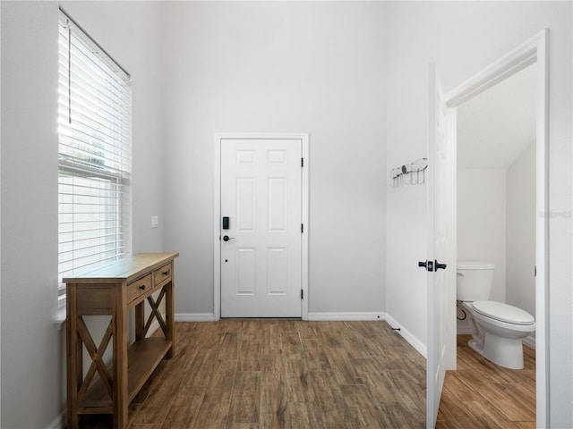 2556 Ocoee Reserve Ct, Ocoee, FL 34761 - foyer with wood finished floors and a high ceiling