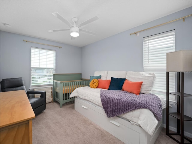 2556 Ocoee Reserve Ct, Ocoee, FL 34761 - carpeted bedroom with ceiling fan