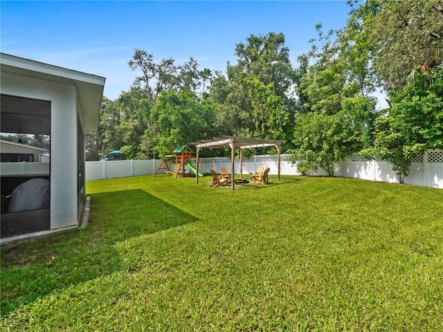 2556 Ocoee Reserve Ct, Ocoee, FL 34761 - fenced backyard featuring a playground