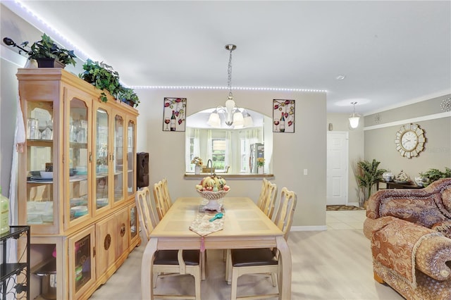 1514 Tamarind Rd, Davenport, FL 33896 - dining room featuring a chandelier