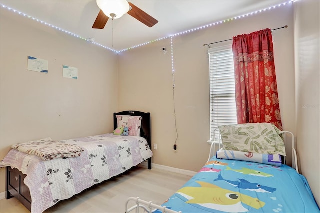 1514 Tamarind Rd, Davenport, FL 33896 - bedroom featuring wood finished floors and ceiling fan