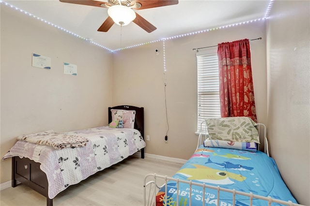 1514 Tamarind Rd, Davenport, FL 33896 - bedroom with wood finished floors and ceiling fan