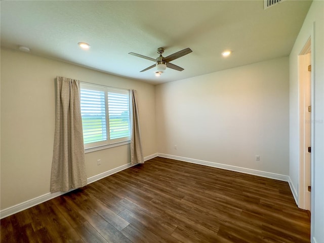 7484 Catania Loop, Clermont, FL 34714 - spare room with ceiling fan, dark wood-style flooring, recessed lighting, and a smoke detector