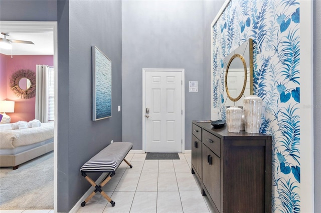 2026 Lelani Cir, Davenport, FL 33897 - foyer with light tile patterned floors and a ceiling fan