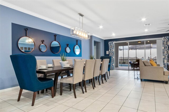 2026 Lelani Cir, Davenport, FL 33897 - dining area featuring ornamental molding, recessed lighting, and light tile patterned flooring