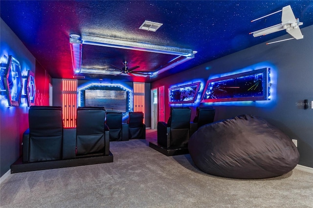 2026 Lelani Cir, Davenport, FL 33897 - cinema featuring carpet flooring, a raised ceiling, and ceiling fan
