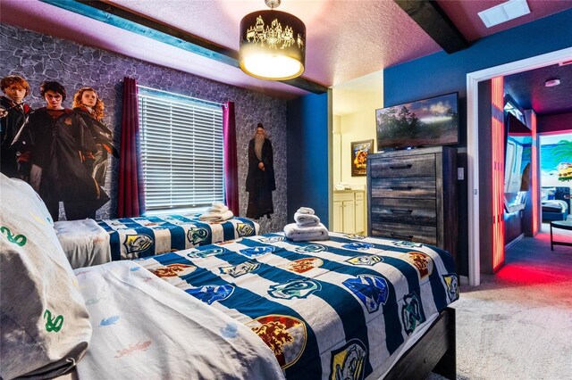2026 Lelani Cir, Davenport, FL 33897 - bedroom featuring carpet floors, a textured ceiling, and ensuite bathroom