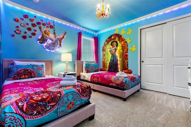 2026 Lelani Cir, Davenport, FL 33897 - carpeted bedroom featuring a chandelier and a closet