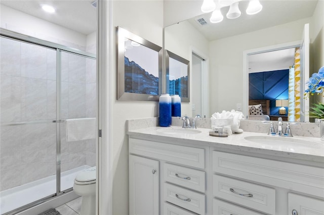 2026 Lelani Cir, Davenport, FL 33897 - ensuite bathroom featuring double vanity, a shower stall, tile patterned flooring, and a chandelier