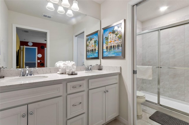 2026 Lelani Cir, Davenport, FL 33897 - bathroom with a shower stall, double vanity, tile patterned flooring, and a chandelier
