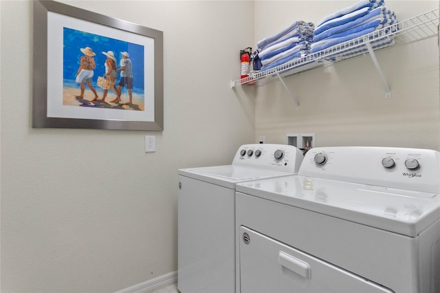 2026 Lelani Cir, Davenport, FL 33897 - laundry room with washing machine and clothes dryer and baseboards