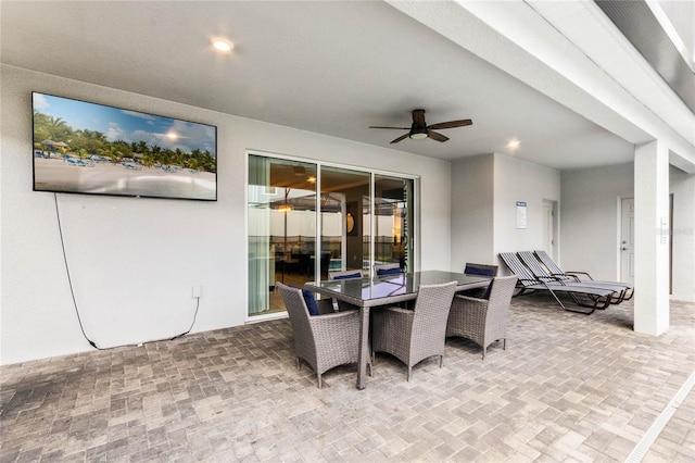 2026 Lelani Cir, Davenport, FL 33897 - view of patio featuring a ceiling fan and outdoor dining space
