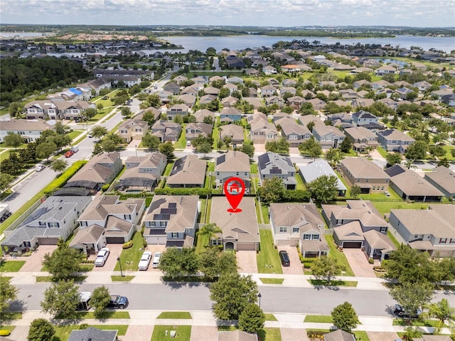 15586 Hamlin Blossom Ave, Winter Garden, FL 34787 - aerial perspective of suburban area with a large body of water