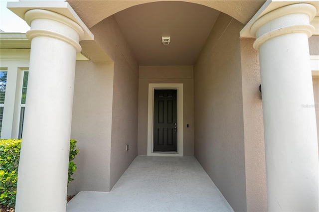 15586 Hamlin Blossom Ave, Winter Garden, FL 34787 - view of exterior entry featuring stucco siding