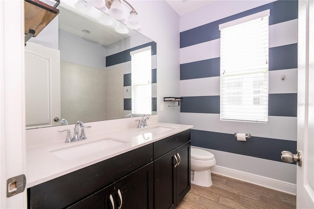 15586 Hamlin Blossom Ave, Winter Garden, FL 34787 - full bathroom featuring double vanity and wood finished floors
