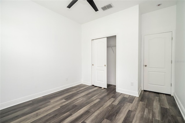 15586 Hamlin Blossom Ave, Winter Garden, FL 34787 - unfurnished bedroom featuring dark wood-style floors, a closet, and a ceiling fan