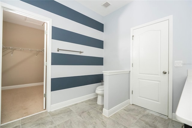 15586 Hamlin Blossom Ave, Winter Garden, FL 34787 - bathroom featuring toilet and a walk in closet