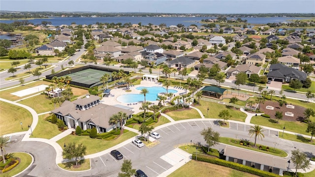 15586 Hamlin Blossom Ave, Winter Garden, FL 34787 - aerial perspective of suburban area featuring a pool and a large body of water