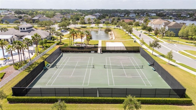 15586 Hamlin Blossom Ave, Winter Garden, FL 34787 - view of tennis court with a residential view and a water view