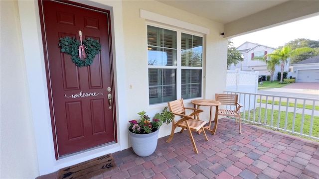 8004 Sweet Orange Ave, Winter Garden, FL 34787 - entrance to property featuring covered porch and stucco siding