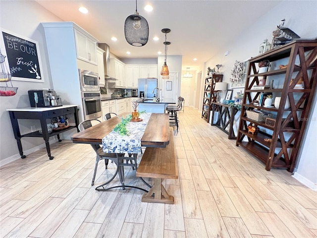 8004 Sweet Orange Ave, Winter Garden, FL 34787 - dining space featuring light wood finished floors and recessed lighting