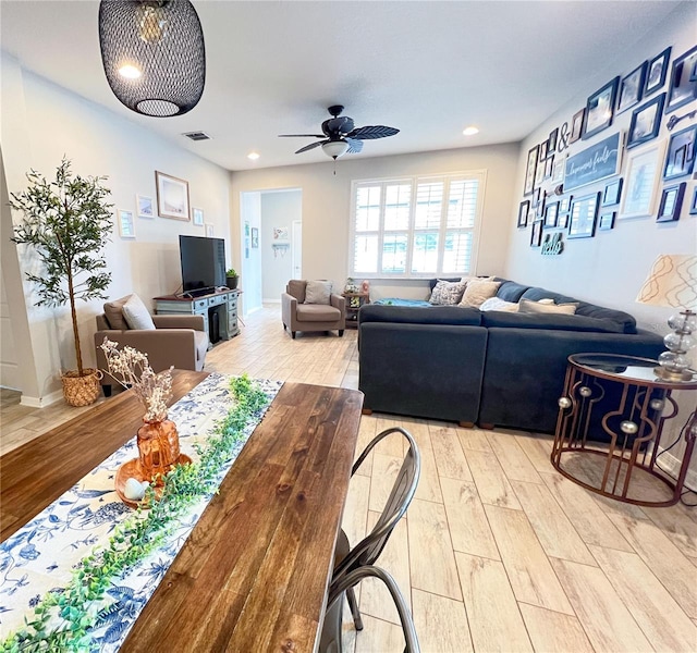 8004 Sweet Orange Ave, Winter Garden, FL 34787 - living area featuring light wood-type flooring, ceiling fan, and recessed lighting