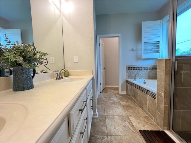 8004 Sweet Orange Ave, Winter Garden, FL 34787 - bathroom featuring double vanity, a garden tub, and a stall shower