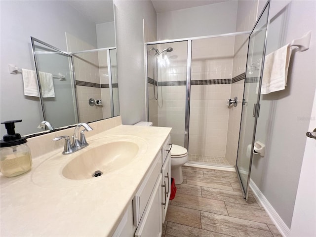 8004 Sweet Orange Ave, Winter Garden, FL 34787 - bathroom with vanity, a stall shower, and wood finished floors