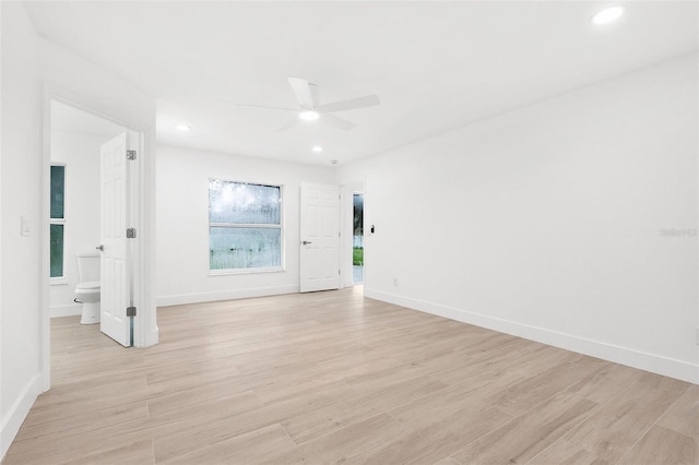 4527 Bamonte St, North Port, FL 34286 - empty room with a ceiling fan, light wood-style flooring, and recessed lighting