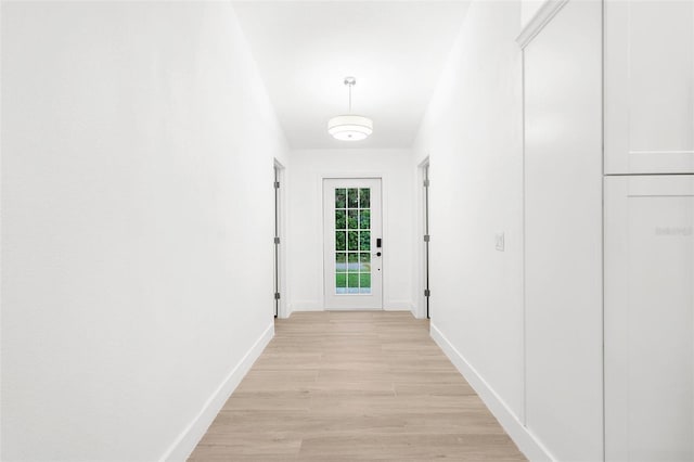 4527 Bamonte St, North Port, FL 34286 - hall featuring baseboards and light wood-type flooring