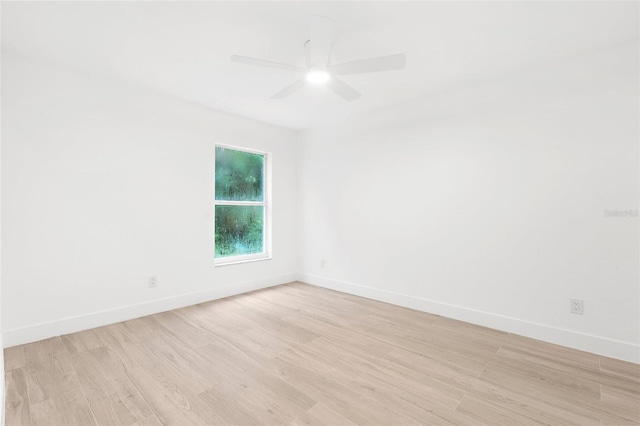 4527 Bamonte St, North Port, FL 34286 - empty room featuring light wood-style flooring and a ceiling fan