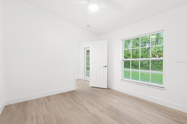 4527 Bamonte St, North Port, FL 34286 - spare room featuring a ceiling fan, light wood-style floors, and vaulted ceiling
