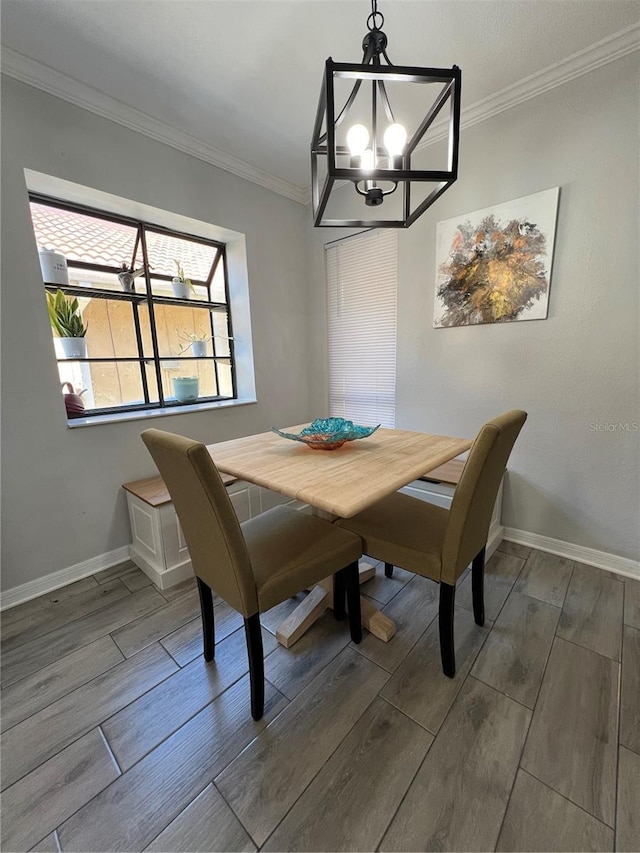 1159 E Winged Foot Cir, Winter Springs, FL 32708 - dining area featuring a chandelier, crown molding, and wood finished floors
