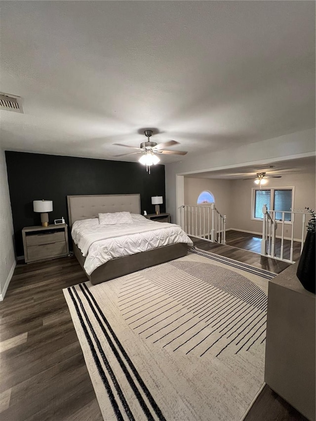 1159 E Winged Foot Cir, Winter Springs, FL 32708 - bedroom featuring dark wood finished floors and ceiling fan