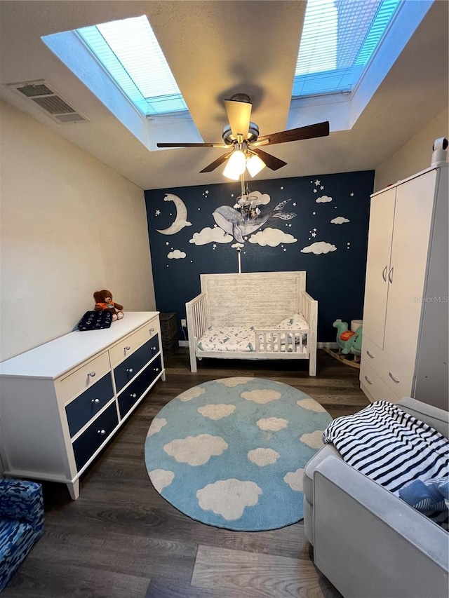 1159 E Winged Foot Cir, Winter Springs, FL 32708 - bedroom with a skylight, wood finished floors, and ceiling fan