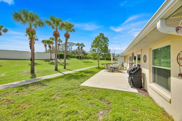 422 Harbourview Dr, Haines City, FL 33844 - view of grassy yard featuring a patio area
